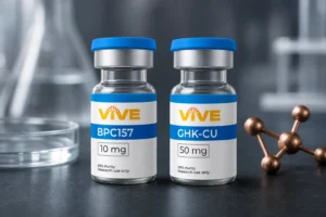 Two VivePeptides research vials representing BPC-157 vs GHK-Cu comparison in a laboratory setting